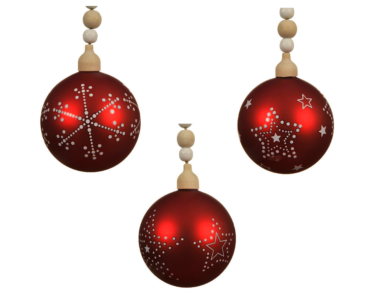 Bola de navidad de cristal rojo con estrellas y puntos