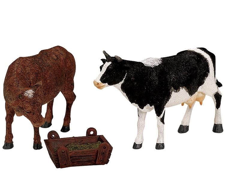 Figuras navideñas de vaca y toro