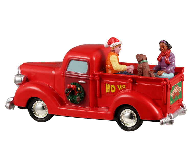 Figuras decorativas paseo navideño cantando villancicos