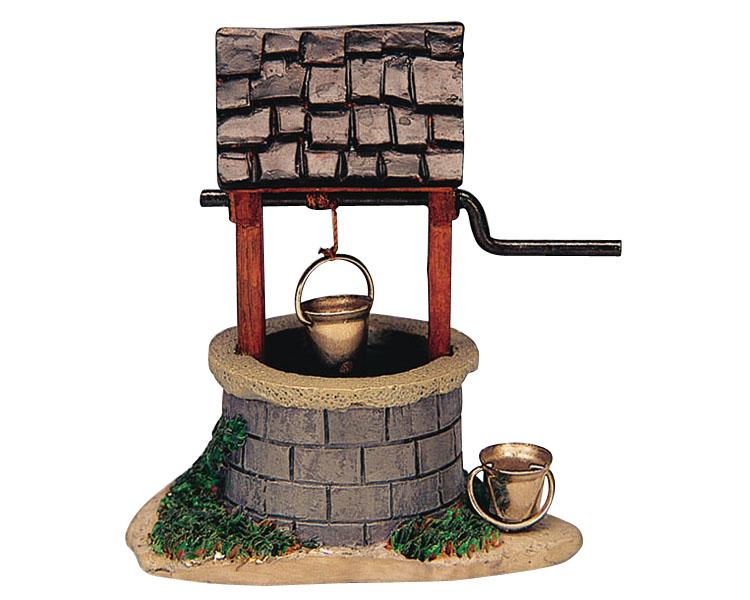 Figura navideña pozo de agua