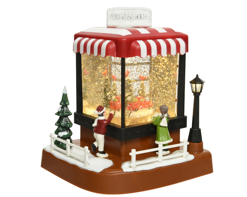Bola de nieve musical en forma de tienda de navidad