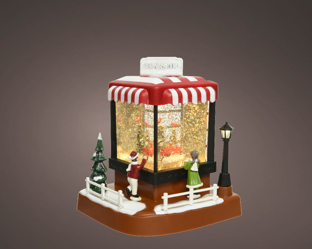 Bola de nieve musical en forma de tienda de navidad