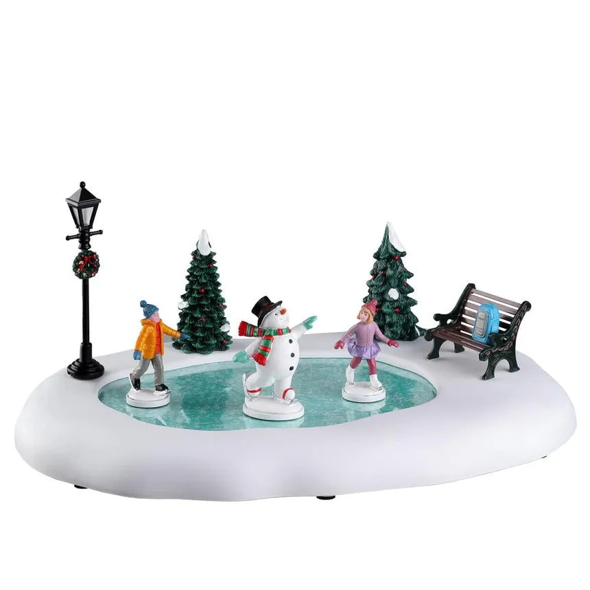Frosty Goes Ice Skating,  B/O (4.5V) Colección Vail Village LEMAX®