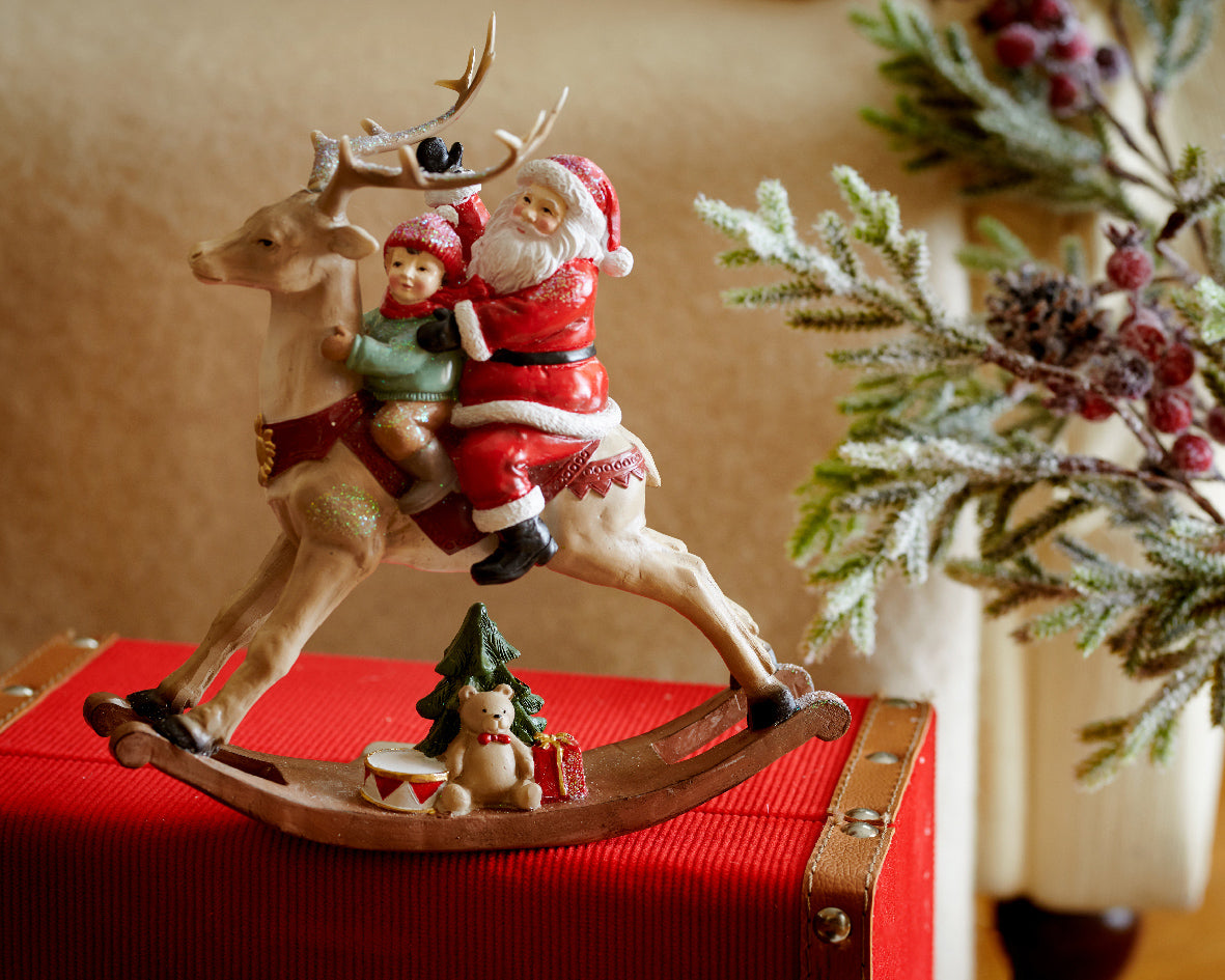 Figura de Santa en cabellito reno de 23cm