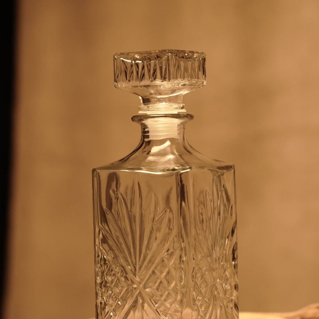 Botella de cristal vintage transparente