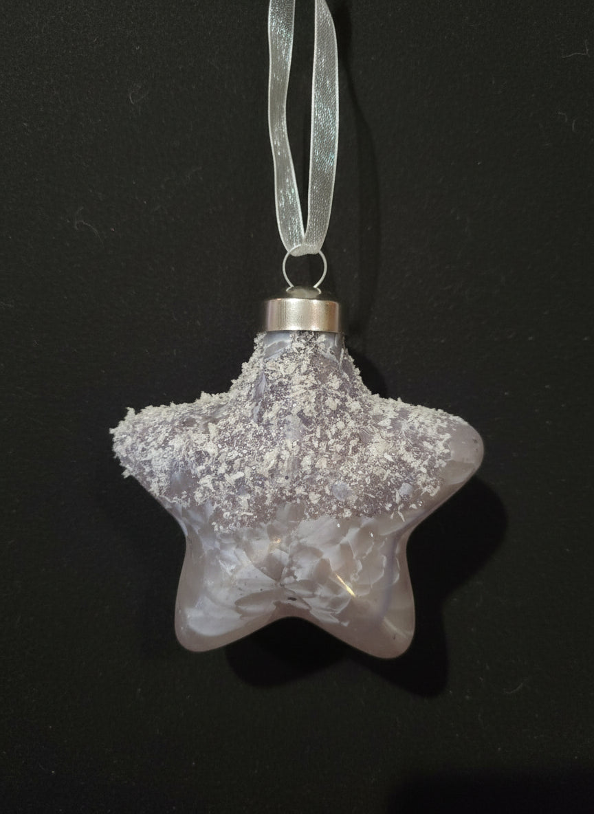 Estrella de cristal con adornos